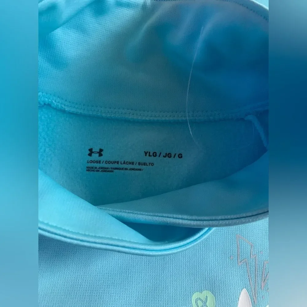 Under Armour girls sweater color baby blue. NWOT